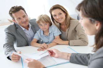 Family meeting real-estate agent to buy new home